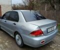 Сірий Міцубісі Lancer, об'ємом двигуна 1.58 л та пробігом 439 тис. км за 2500 $, фото 4 на Automoto.ua