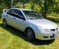 Сірий Міцубісі Lancer, об'ємом двигуна 1.6 л та пробігом 272 тис. км за 3103 $, фото 1 на Automoto.ua