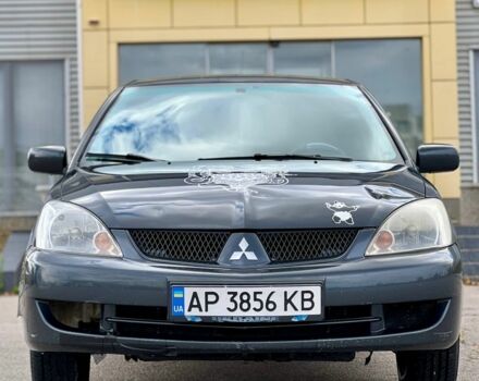 Серый Мицубиси Лансер, объемом двигателя 1.6 л и пробегом 490 тыс. км за 1799 $, фото 2 на Automoto.ua