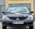 Серый Мицубиси Лансер, объемом двигателя 1.6 л и пробегом 490 тыс. км за 1799 $, фото 2 на Automoto.ua