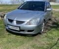 Серый Мицубиси Лансер, объемом двигателя 1.6 л и пробегом 428 тыс. км за 2800 $, фото 1 на Automoto.ua