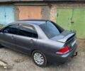 Сірий Міцубісі Lancer, об'ємом двигуна 1.58 л та пробігом 307 тис. км за 3800 $, фото 3 на Automoto.ua