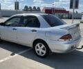 Сірий Міцубісі Lancer, об'ємом двигуна 1.6 л та пробігом 364 тис. км за 2299 $, фото 4 на Automoto.ua