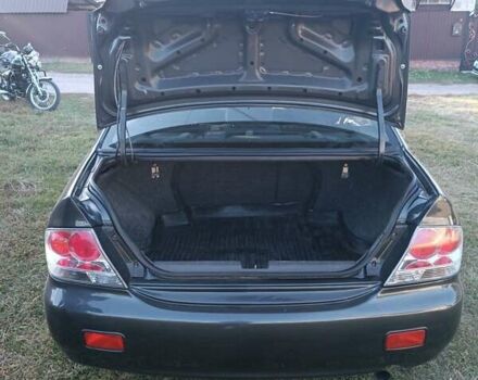 Мицубиси Лансер 2004 в Нежине на Automoto.ua Серый Мицубиси Лансер, объемом двигателя 2 л и пробегом 280 тыс. км за 6000 $, фото 14 на Automoto.ua