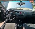 Серый Мицубиси Лансер, объемом двигателя 1.58 л и пробегом 450 тыс. км за 3400 $, фото 9 на Automoto.ua