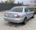 Сірий Міцубісі Lancer, об'ємом двигуна 1.3 л та пробігом 299 тис. км за 3800 $, фото 3 на Automoto.ua