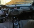 Сірий Міцубісі Lancer, об'ємом двигуна 1.6 л та пробігом 273 тис. км за 2800 $, фото 7 на Automoto.ua