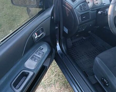 Мицубиси Лансер 2004 в Нежине на Automoto.ua Серый Мицубиси Лансер, объемом двигателя 2 л и пробегом 280 тыс. км за 6000 $, фото 3 на Automoto.ua