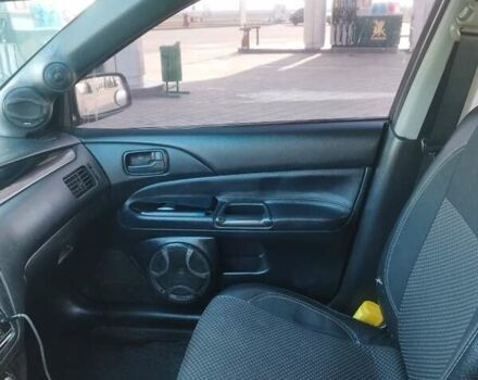 Сірий Міцубісі Lancer, об'ємом двигуна 1.58 л та пробігом 360 тис. км за 4000 $, фото 12 на Automoto.ua