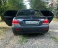 Серый Мицубиси Лансер, объемом двигателя 1.58 л и пробегом 370 тыс. км за 3800 $, фото 5 на Automoto.ua