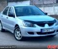 Сірий Міцубісі Lancer, об'ємом двигуна 1.3 л та пробігом 250 тис. км за 4100 $, фото 1 на Automoto.ua