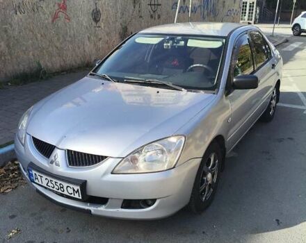 Сірий Міцубісі Lancer, об'ємом двигуна 1.58 л та пробігом 320 тис. км за 3700 $, фото 4 на Automoto.ua