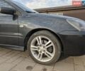 Сірий Міцубісі Lancer, об'ємом двигуна 2 л та пробігом 306 тис. км за 4000 $, фото 27 на Automoto.ua