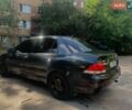 Серый Мицубиси Лансер, объемом двигателя 1.59 л и пробегом 300 тыс. км за 2499 $, фото 11 на Automoto.ua
