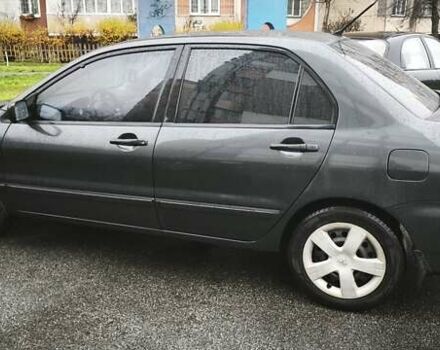 Сірий Міцубісі Lancer, об'ємом двигуна 1.58 л та пробігом 110 тис. км за 2999 $, фото 3 на Automoto.ua