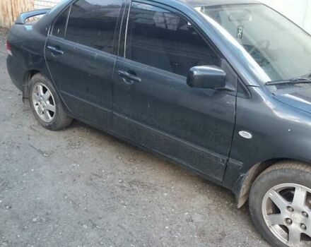 Сірий Міцубісі Lancer, об'ємом двигуна 1.58 л та пробігом 531 тис. км за 2828 $, фото 2 на Automoto.ua