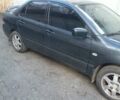 Сірий Міцубісі Lancer, об'ємом двигуна 1.58 л та пробігом 531 тис. км за 2828 $, фото 2 на Automoto.ua