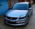 Сірий Міцубісі Lancer, об'ємом двигуна 2 л та пробігом 204 тис. км за 5200 $, фото 1 на Automoto.ua
