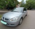 Сірий Міцубісі Lancer, об'ємом двигуна 1.6 л та пробігом 220 тис. км за 3800 $, фото 1 на Automoto.ua