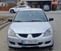 Сірий Міцубісі Lancer, об'ємом двигуна 1.58 л та пробігом 360 тис. км за 2850 $, фото 1 на Automoto.ua