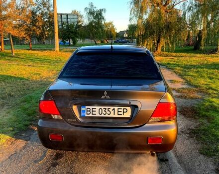 Серый Мицубиси Лансер, объемом двигателя 1.6 л и пробегом 275 тыс. км за 3000 $, фото 5 на Automoto.ua