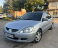 Сірий Міцубісі Lancer, об'ємом двигуна 1.58 л та пробігом 220 тис. км за 4400 $, фото 1 на Automoto.ua