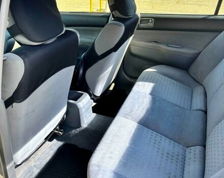 Серый Мицубиси Лансер, объемом двигателя 1.3 л и пробегом 245 тыс. км за 3000 $, фото 10 на Automoto.ua