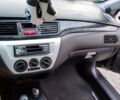 Серый Мицубиси Лансер, объемом двигателя 1.58 л и пробегом 195 тыс. км за 4000 $, фото 45 на Automoto.ua