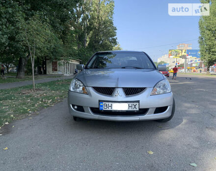 Сірий Міцубісі Lancer, об'ємом двигуна 1.6 л та пробігом 300 тис. км за 4599 $, фото 9 на Automoto.ua