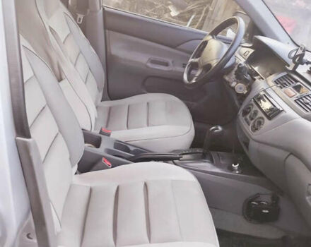 Серый Мицубиси Лансер, объемом двигателя 1.3 л и пробегом 450 тыс. км за 3500 $, фото 7 на Automoto.ua