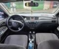 Сірий Міцубісі Lancer, об'ємом двигуна 0.16 л та пробігом 216 тис. км за 4150 $, фото 6 на Automoto.ua