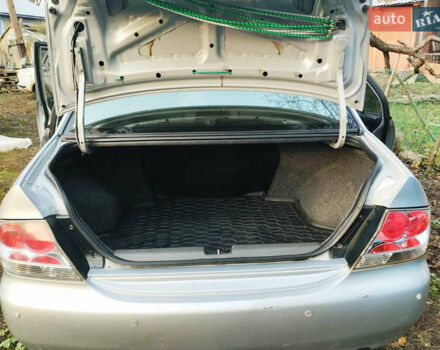 Серый Мицубиси Лансер, объемом двигателя 1.3 л и пробегом 450 тыс. км за 3500 $, фото 5 на Automoto.ua