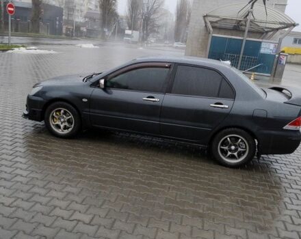 Сірий Міцубісі Lancer, об'ємом двигуна 1.6 л та пробігом 177 тис. км за 4500 $, фото 20 на Automoto.ua