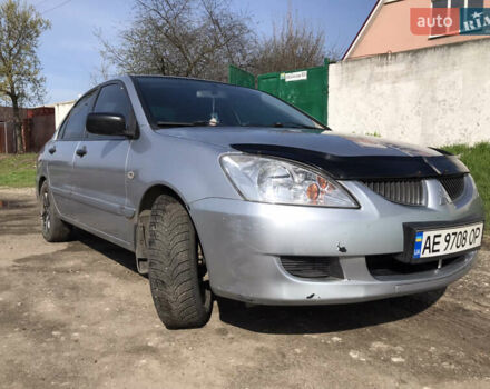 Мицубиси Лансер 2004 в Днепре (Днепропетровске) на Automoto.ua Серый Мицубиси Лансер, объемом двигателя 1.59 л и пробегом 294 тыс. км за 4699 $, фото 1 на Automoto.ua