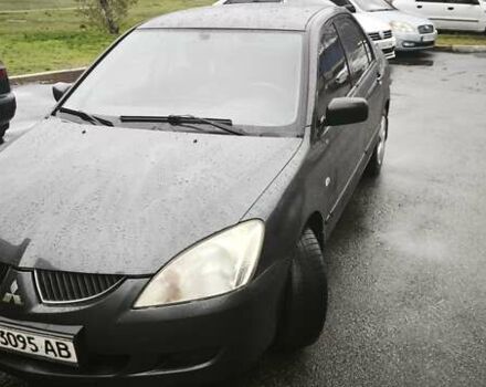 Сірий Міцубісі Lancer, об'ємом двигуна 1.58 л та пробігом 110 тис. км за 2999 $, фото 1 на Automoto.ua