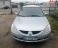 Міцубісі Lancer 2004 у Харкові на Automoto.ua Сірий Міцубісі Lancer, об'ємом двигуна 1.58 л та пробігом 248 тис. км за 3550 $, фото 1 на Automoto.ua
