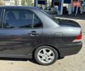 Серый Мицубиси Лансер, объемом двигателя 1.58 л и пробегом 167 тыс. км за 5100 $, фото 7 на Automoto.ua