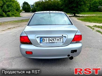 Серый Мицубиси Лансер, объемом двигателя 1.6 л и пробегом 260 тыс. км за 2900 $, фото 3 на Automoto.ua