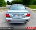 Серый Мицубиси Лансер, объемом двигателя 1.6 л и пробегом 260 тыс. км за 2900 $, фото 3 на Automoto.ua