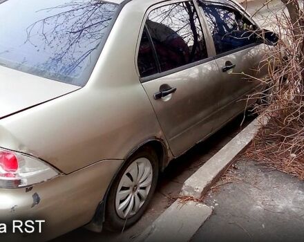 Сірий Міцубісі Lancer, об'ємом двигуна 1.3 л та пробігом 1 тис. км за 2500 $, фото 2 на Automoto.ua