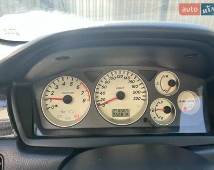 Сірий Міцубісі Lancer, об'ємом двигуна 1.58 л та пробігом 262 тис. км за 3900 $, фото 8 на Automoto.ua