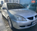 Сірий Міцубісі Lancer, об'ємом двигуна 1.3 л та пробігом 376 тис. км за 3700 $, фото 2 на Automoto.ua