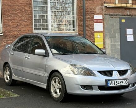 Серый Мицубиси Лансер, объемом двигателя 2 л и пробегом 180 тыс. км за 3700 $, фото 3 на Automoto.ua