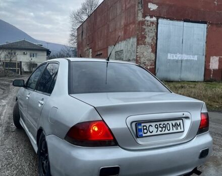 Серый Мицубиси Лансер, объемом двигателя 1.6 л и пробегом 315 тыс. км за 2950 $, фото 3 на Automoto.ua