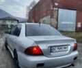 Серый Мицубиси Лансер, объемом двигателя 1.6 л и пробегом 315 тыс. км за 2950 $, фото 3 на Automoto.ua