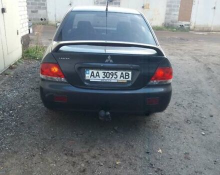 Сірий Міцубісі Lancer, об'ємом двигуна 1.58 л та пробігом 531 тис. км за 2828 $, фото 4 на Automoto.ua