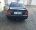 Сірий Міцубісі Lancer, об'ємом двигуна 1.58 л та пробігом 531 тис. км за 2828 $, фото 4 на Automoto.ua