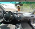 Сірий Міцубісі Lancer, об'ємом двигуна 1.6 л та пробігом 220 тис. км за 3800 $, фото 4 на Automoto.ua