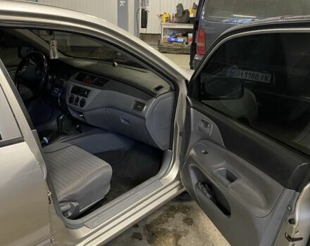 Сірий Міцубісі Lancer, об'ємом двигуна 1.3 л та пробігом 304 тис. км за 3950 $, фото 3 на Automoto.ua