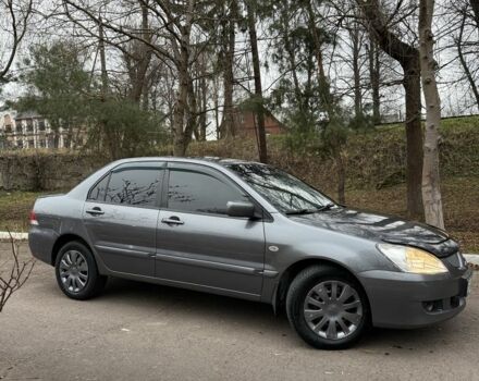 Сірий Міцубісі Lancer, об'ємом двигуна 1.6 л та пробігом 230 тис. км за 2799 $, фото 6 на Automoto.ua